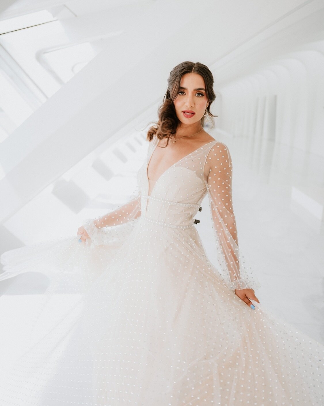 Gabriela. 

Shoot Team: 
Curated by @morrevents + @milwaukeeflowerco for @ourpetitemag 
Hair: @thomasdeanhairco
Makeup: @shalisaelizabeth_ // @brandywatkinsbeauty 
Gowns: @whitedressbridalboutique
Bespoke jewelry: @paloma_wilder
Suiting: @suitshopoff