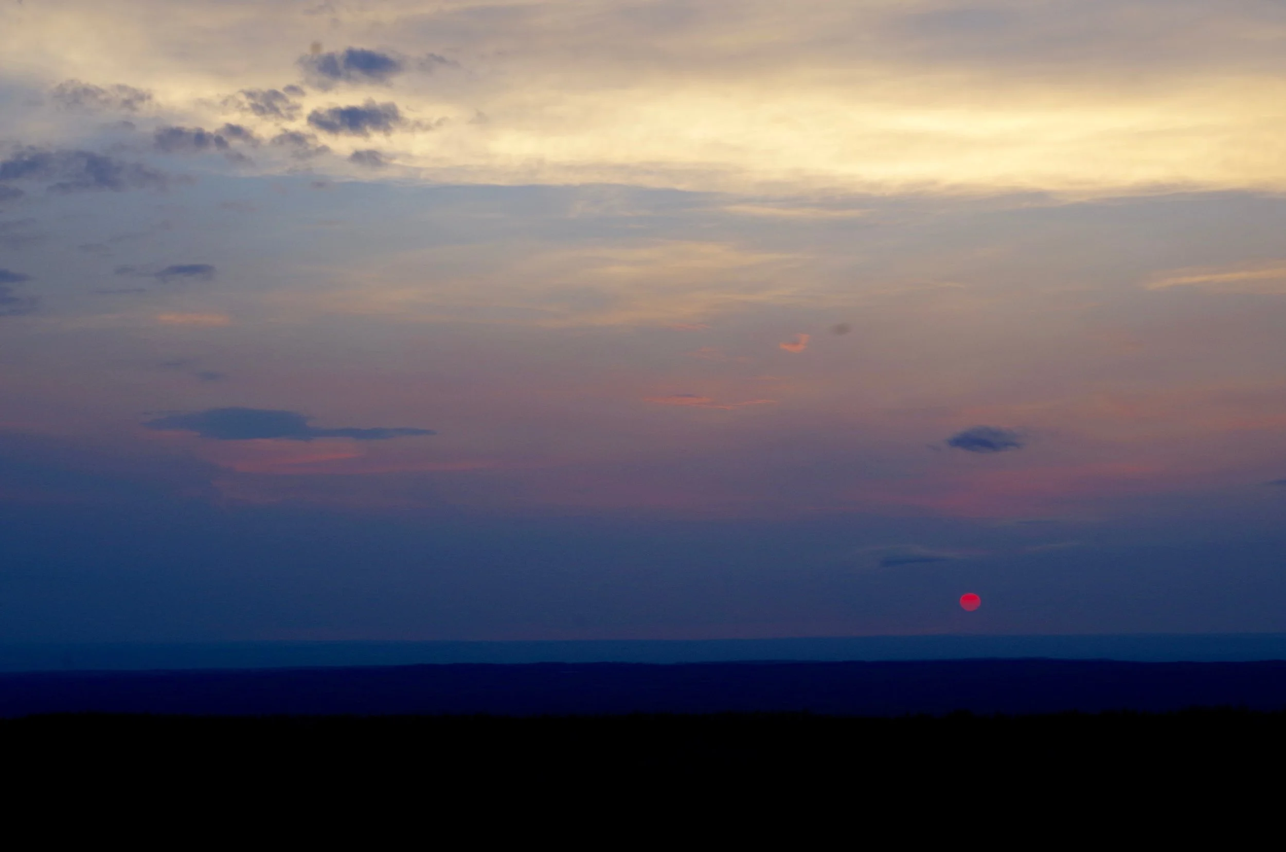 The solstice sun setting in the west. (Photo Credit: Trina Moyles)