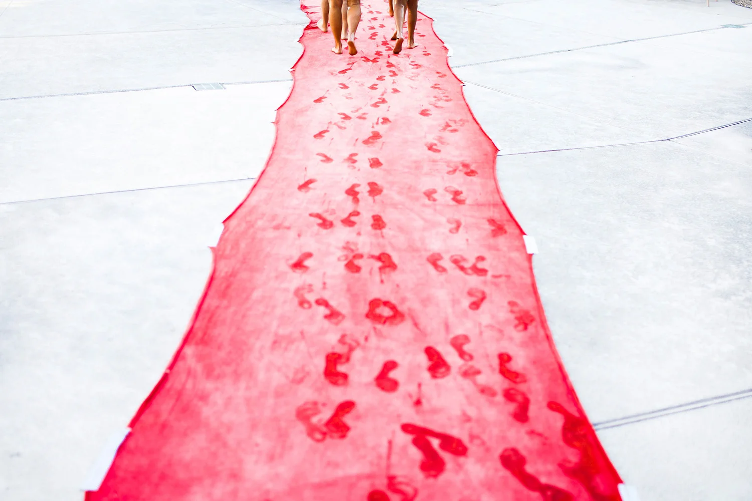 Wet Red Carpet for Daily News-Sun
