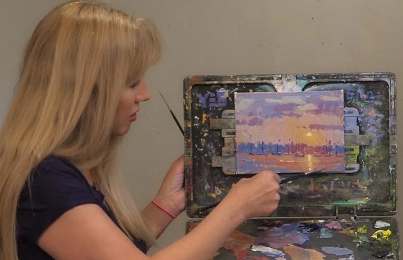 Debra painting Sunset.jpg