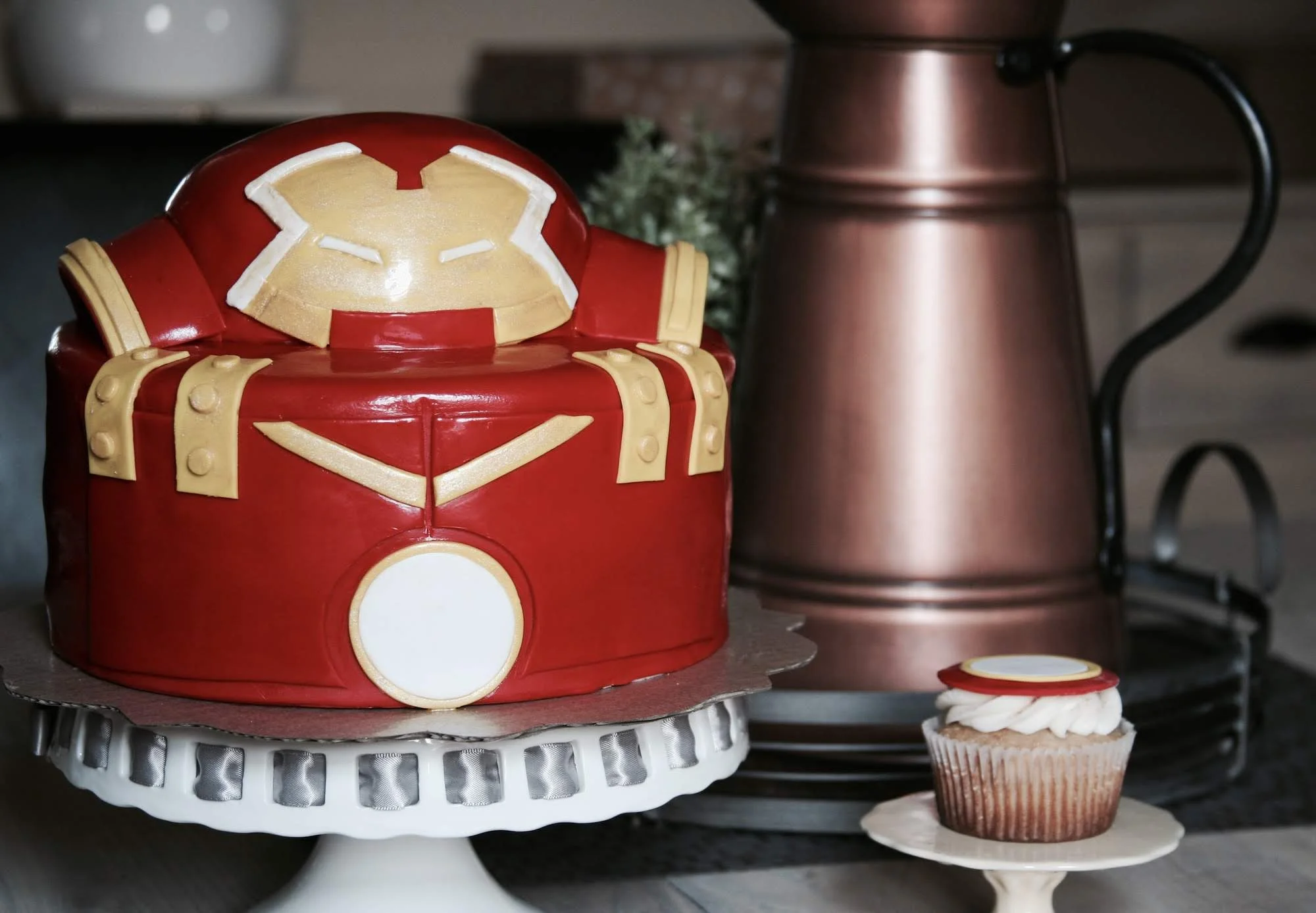 Original Hulk Buster Design Birthday Cake made of fondant with matching buttercream cupcakes.