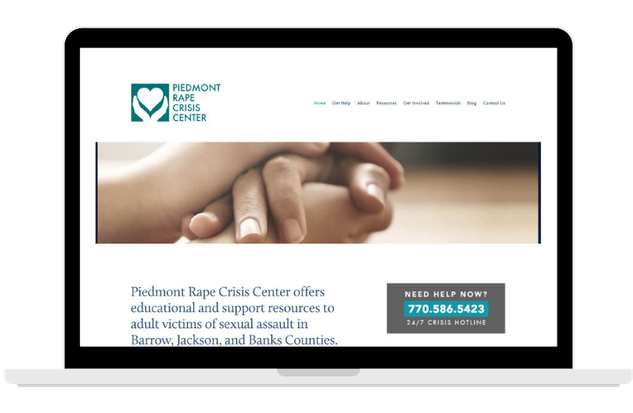 Laptop displaying the Piedmont Rape Crisis Center website, which offers resources for adult victims of sexual assault in several counties, with a contact hot line number.