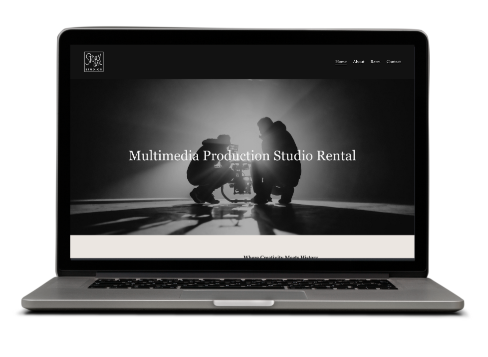 Laptop displaying a website for a multimedia production studio rental, with a black and white background image of two people working with filming equipment.