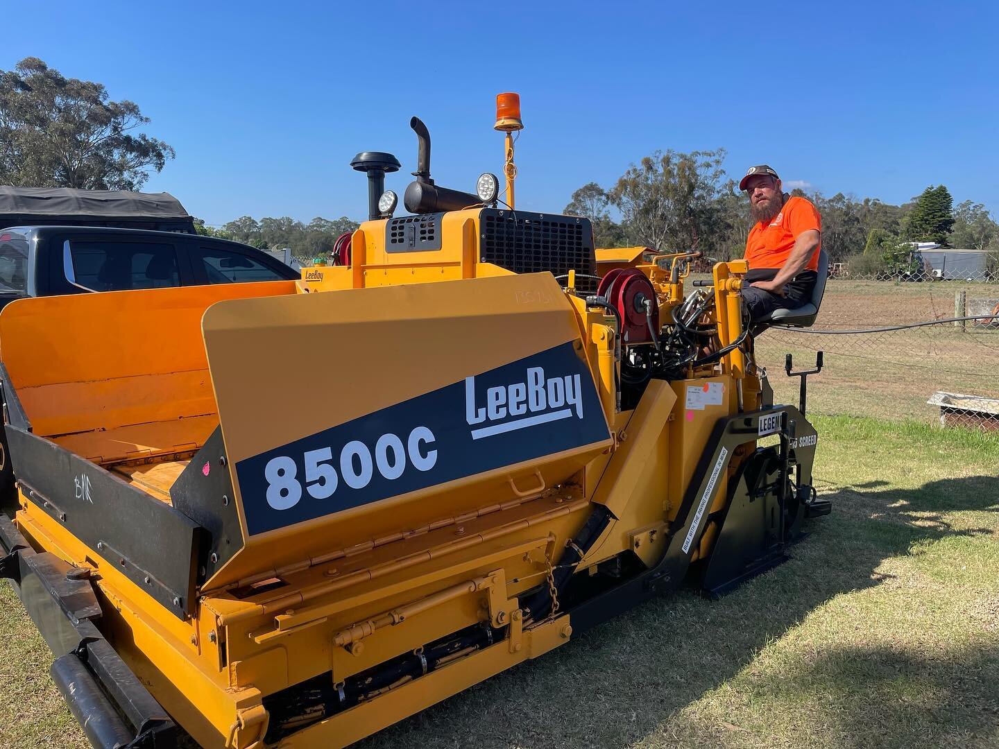 Well, well, well, look who's arrived! Our new Leeboy Paver has graced us with her presence!

Now, it's time for us to put our thinking caps on and figure out the ins and outs of this magnificent machine. A little bit of a challenge, but nothing we ca