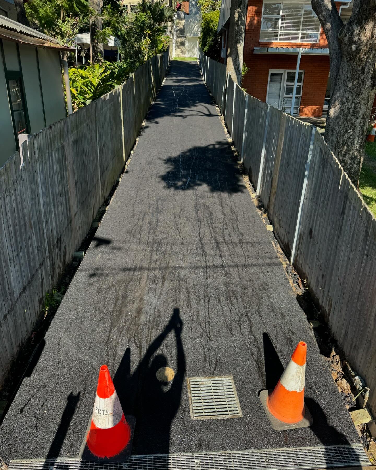 Ah, what a delightful little project we had in Dee Why today! The space was a tad too narrow for our marvelous LEEBOY machine, but fear not, we took matters into our own hands and skillfully laid the asphalt manually! The trials and tribulations of t