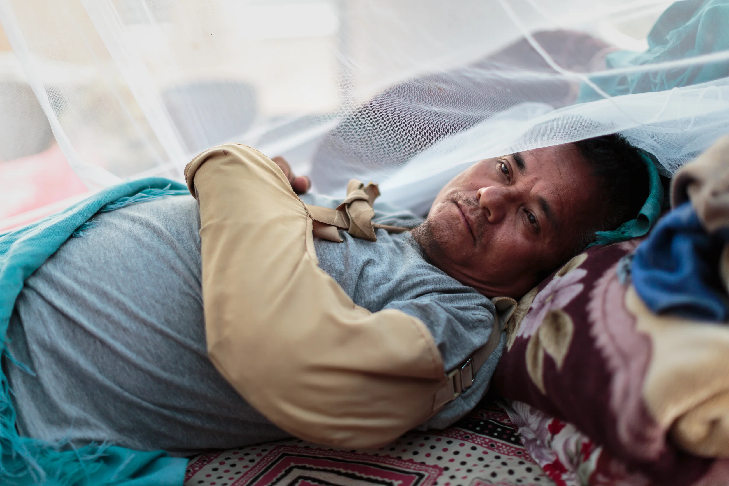 Binot Kumar Lama sustained injuries to his head and arm during the 2015 Nepal earthquake. His family home was destroyed, leaving him and his wife seeking shelter in a temporary camp with little protection and limited access to medical treatment.