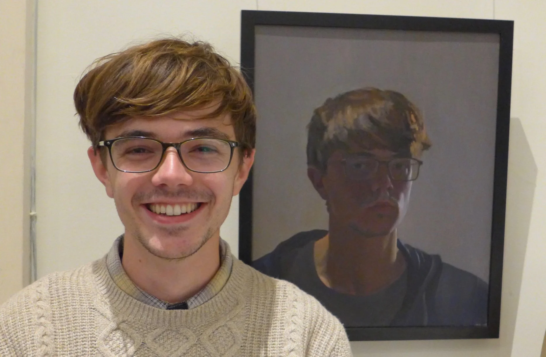 Jonathan and his self portrait at the 2018 SPAs