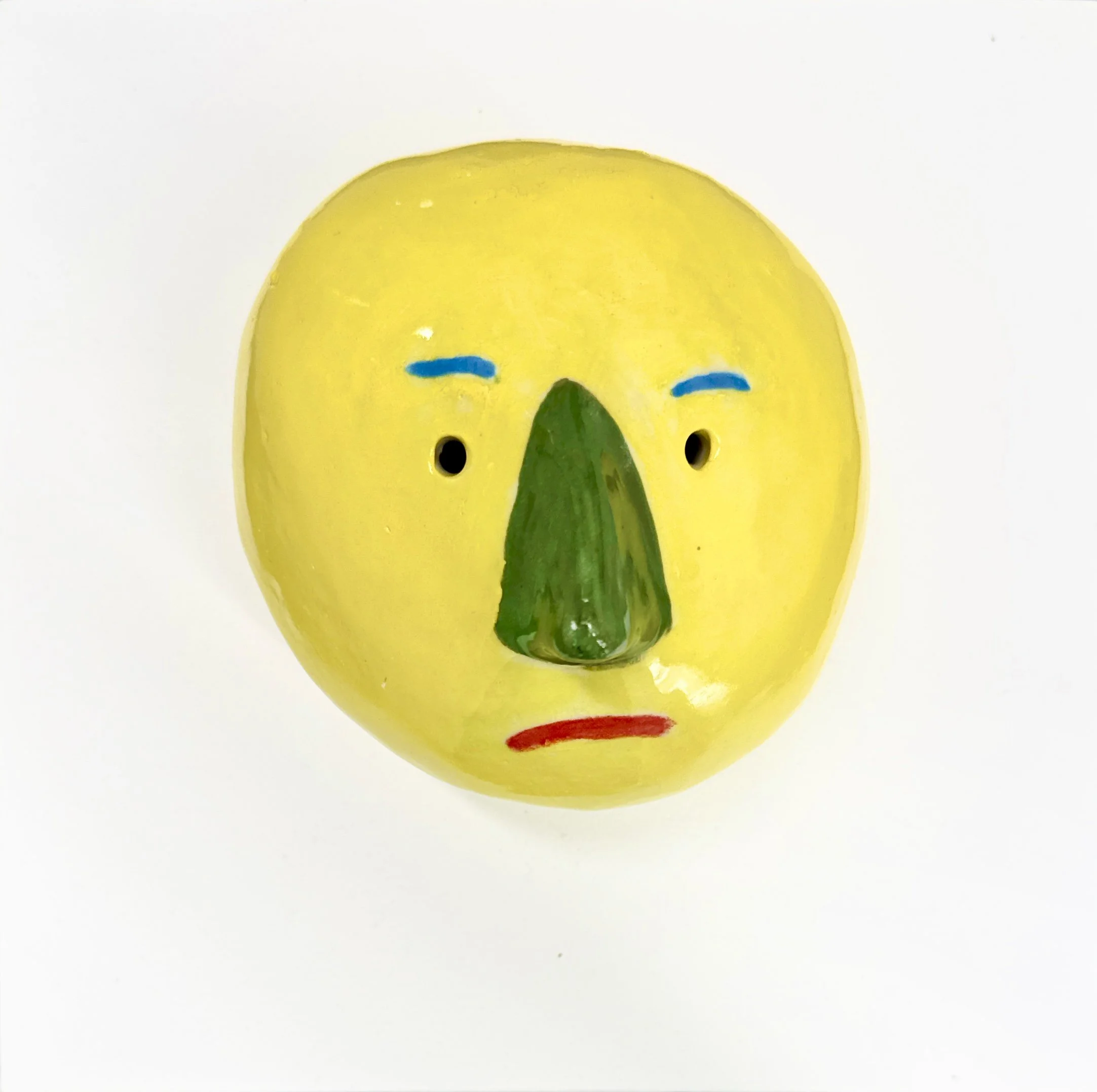   Man With Yellow Head  4”x4”x4”  Porcelain, Glaze 