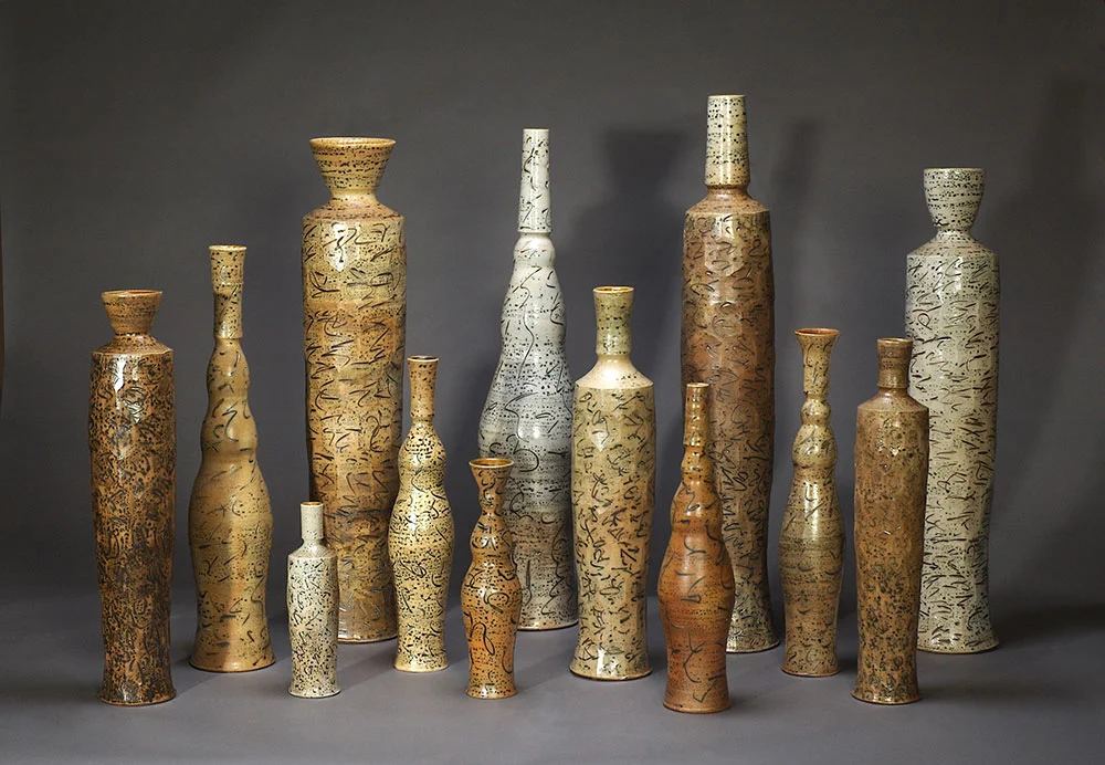 1. Bottle Group , wood-fired, salt-glazed stoneware, tallest 51"h (2008)