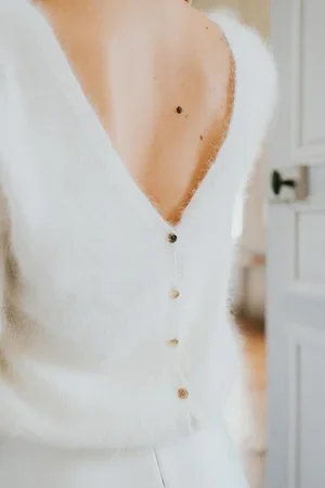 un pul gilet réversible porté par une actrice au cinéma, styliste Gaelle Fresco