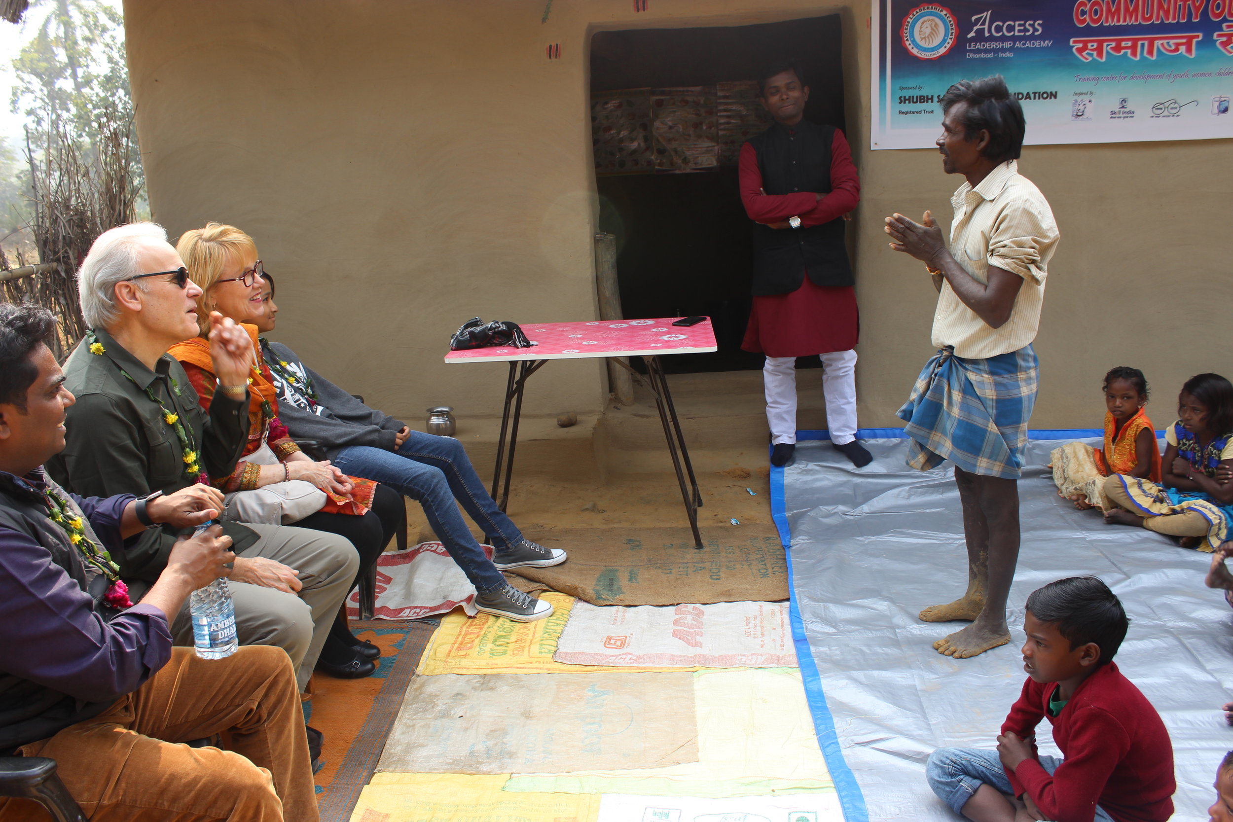  chief of village greeting us with thanks for investing in the children. 