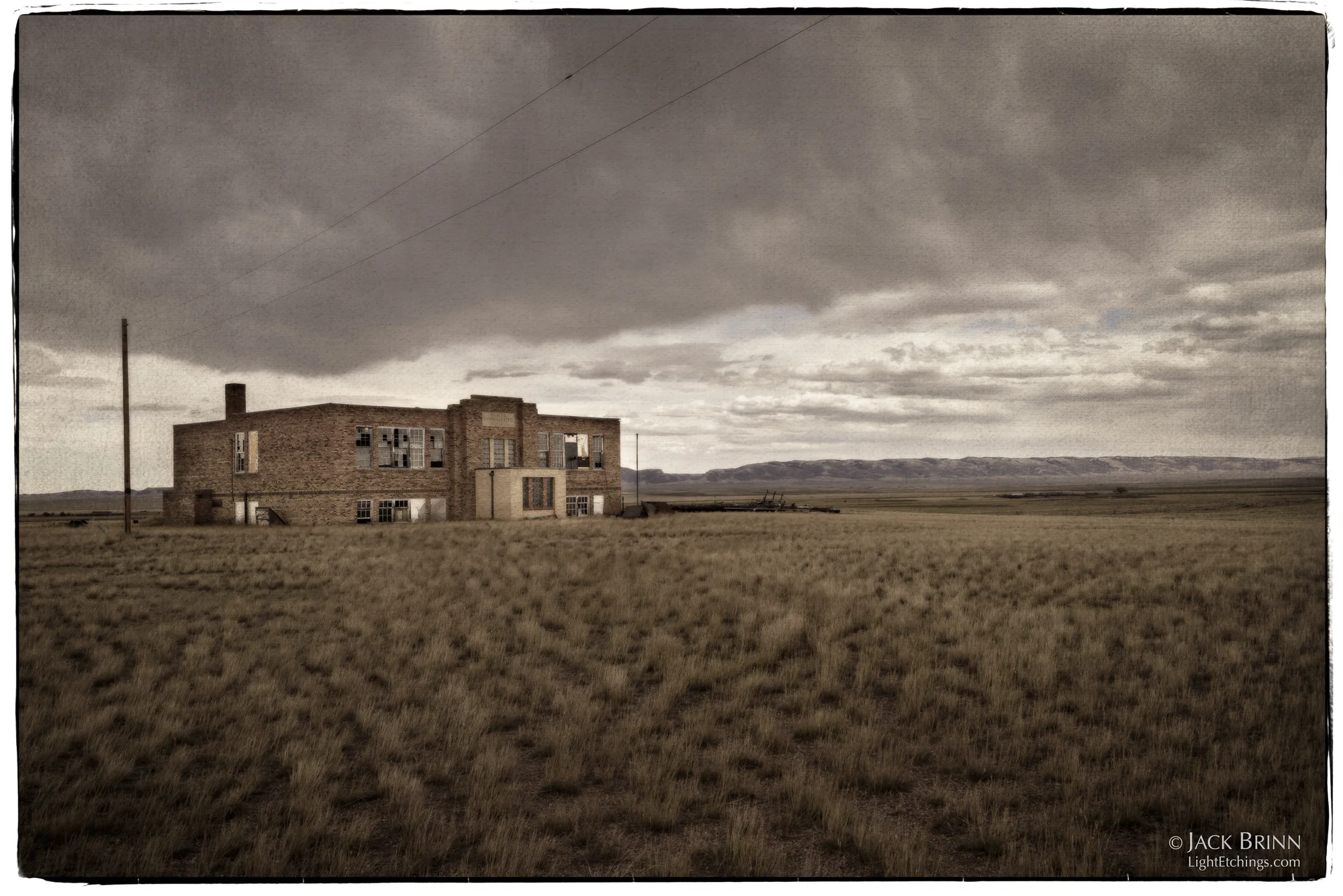The Bosler Consolidated School sits starkly empty on the plains on the north side of town. There are miles of open space between the school and the distant Laramie Range forming the horizon. There’s a road over there in the distance, where cars are mere specks.