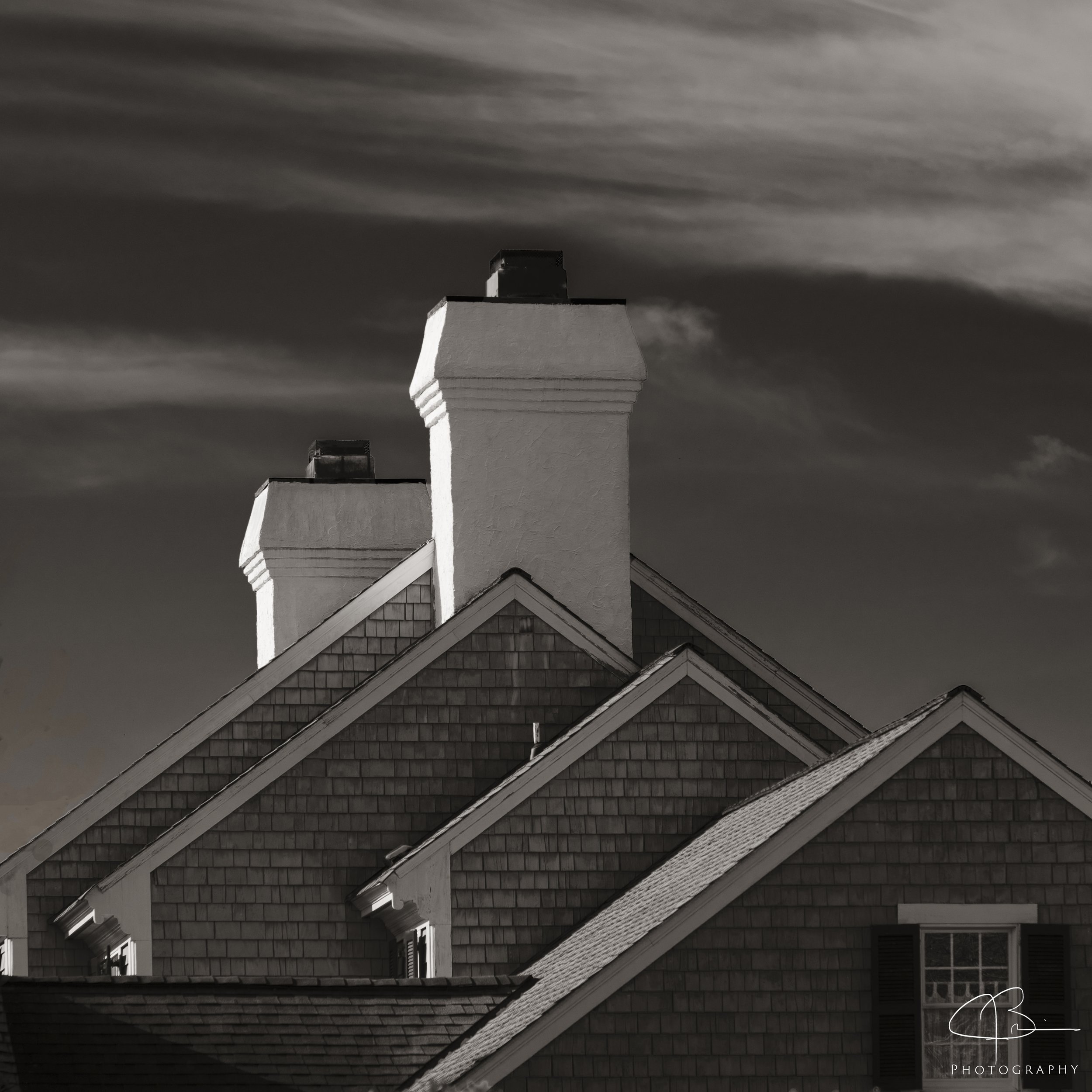 Roofs, Chimneys and Clouds