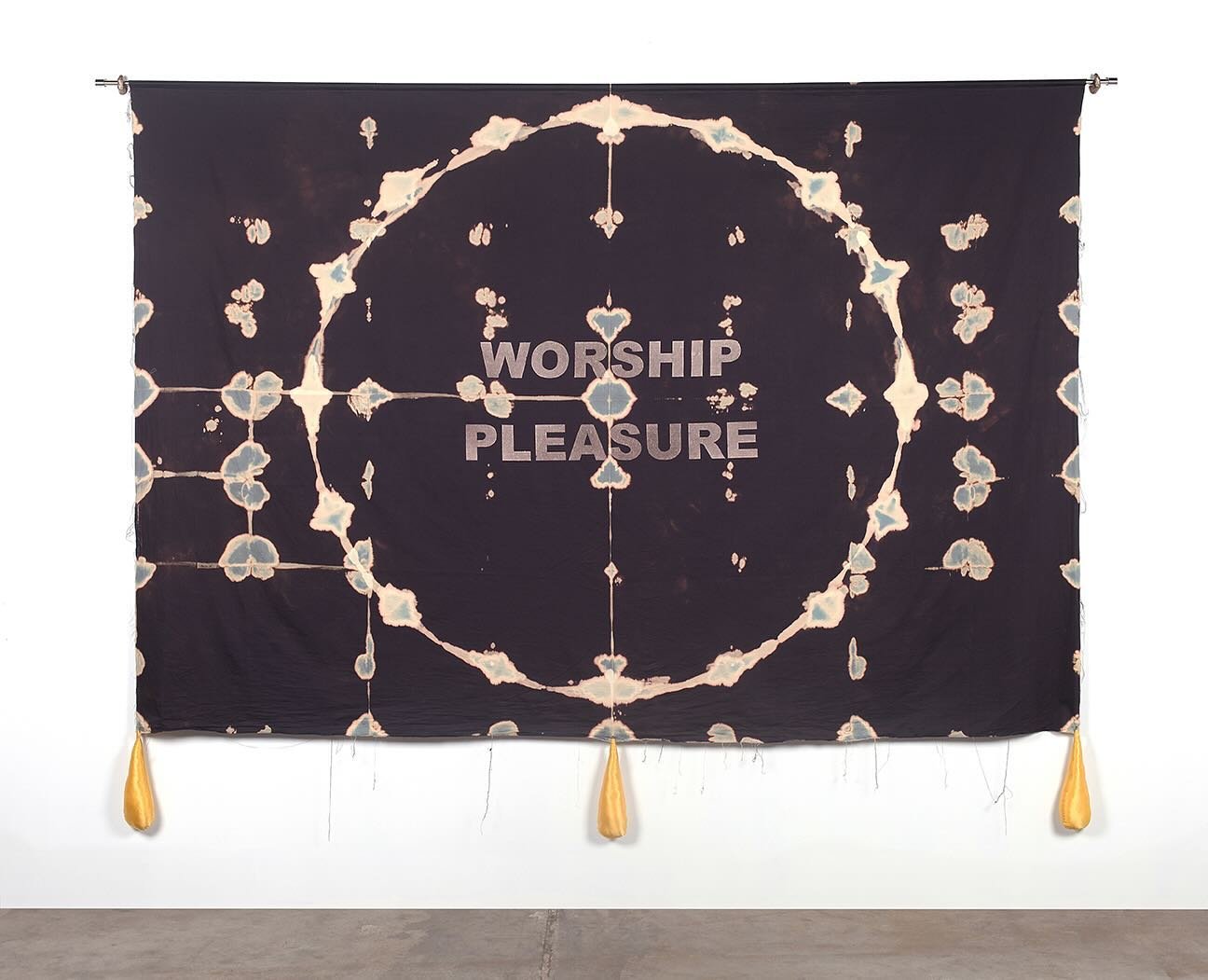 WORSHIP PLEASURE
2024
Cotton, bleach, silk, steel, bronze finger hooks (or chain when suspended).
215 x 284 x 7 cm

At the heart of this collection lies the circle, a symbol of awakening and altered states of being. Each artwork is a portal inviting 