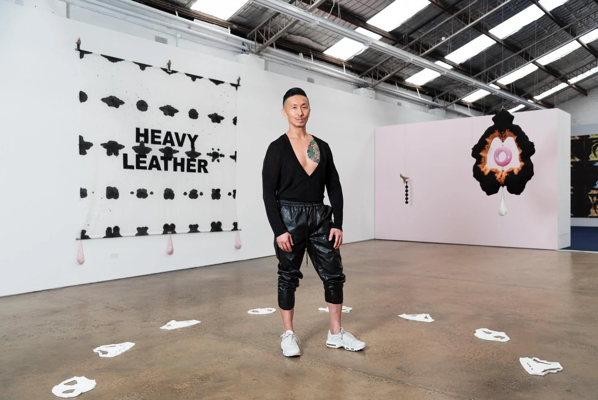 Heavy Leather explores pleasure as power, resistance, and healing. This body of work approaches dominance and submission as gestures of care and consent, inviting viewers into a ritual space of devotion where power exchange unfolds as a language of i