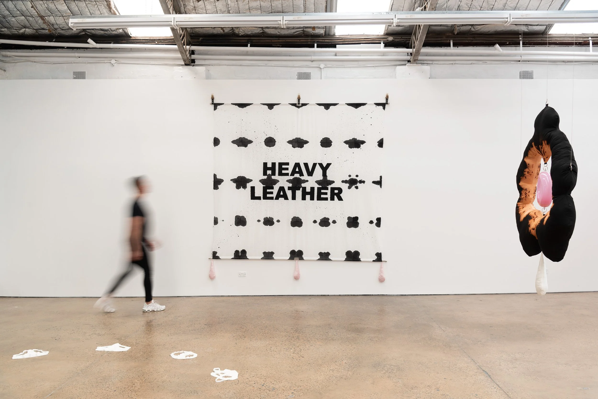  HEAVY LEATHER 2026 Deconstructed cotton bedsheet, Chinese ink, spray paint, bronze finger hooks, leather, silk, steel 276 x 265 x 7 cm    Photograph: Garry Trinh 