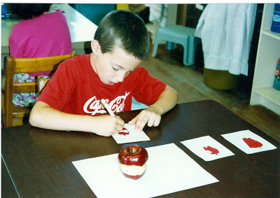 This student is drawing the various stages of an apple as he eats it as seen in the lesson Look, Eat, and Draw .
