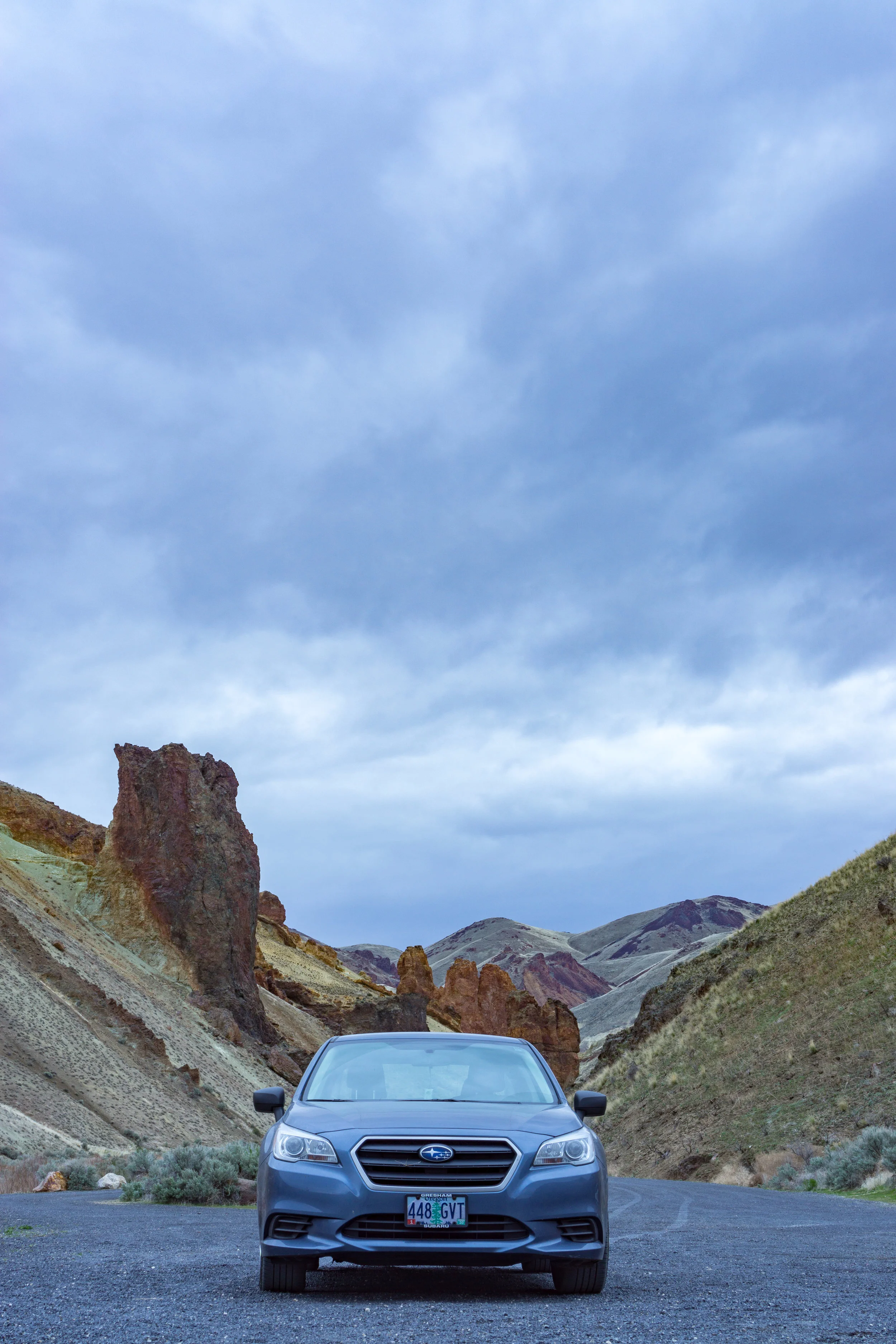 With the sunrise not happening and also being very windy, I looked back at my car and noticed the rock formations in the background. I stared at my car for a bit and thought to myself what am I doing? My father said, "Are you going to take a photo of your car?" I said, "Of course!" I set up the tripod and took the photo. Used Sony E 35mm ISO 100 2s f/11, Edited in lightroom.