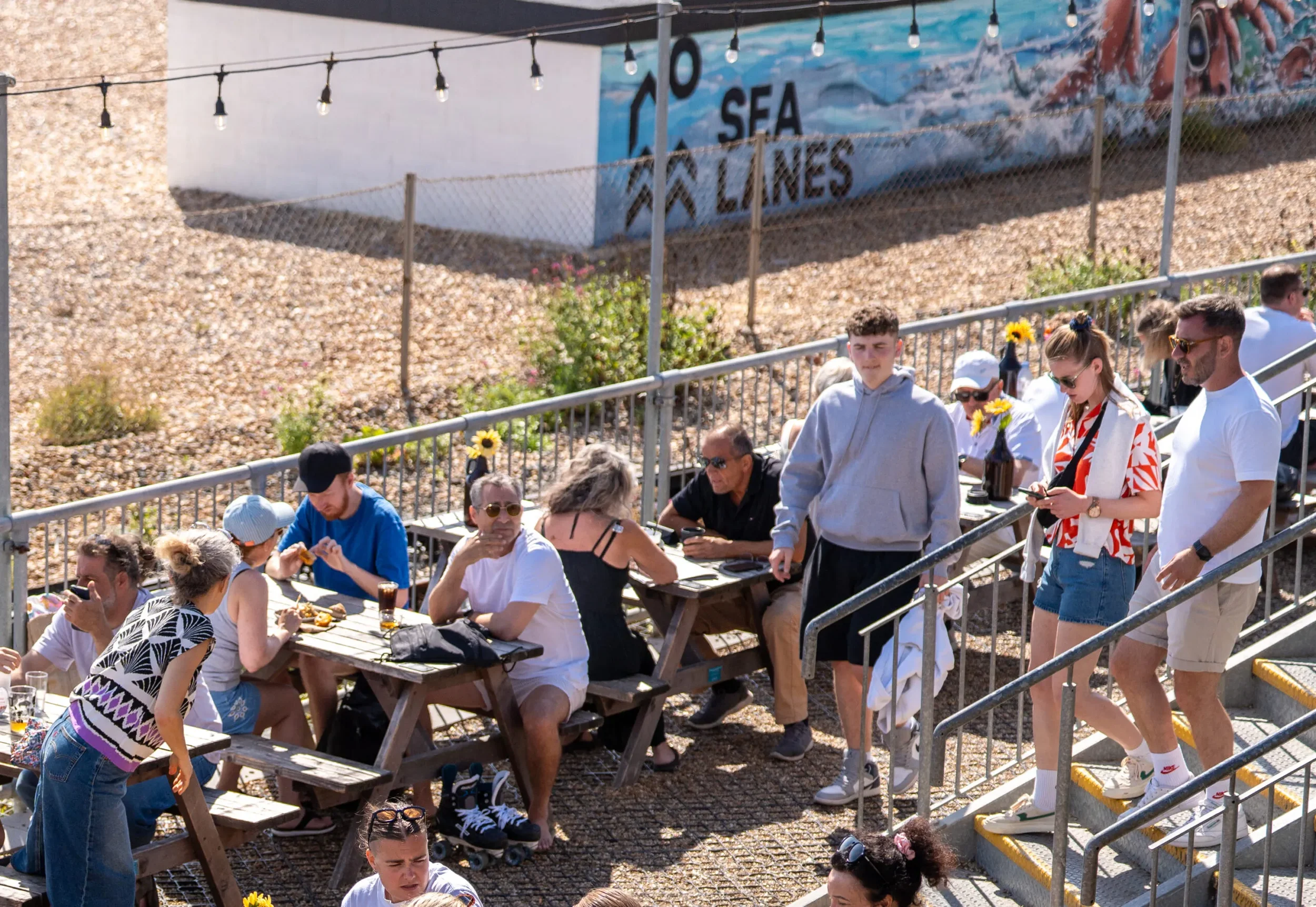 Sea-Lanes-People-on-Brighton-Beach-scaled.webp