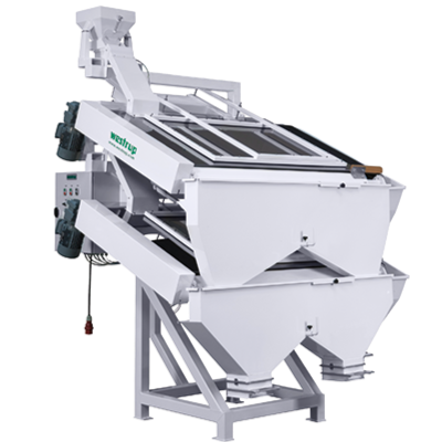 Eine große Industriemaschine mit weißem Rahmen und schwarzen sowie grauen Bauteilen, die zur Materialbearbeitung oder Fertigung eingesetzt wird.