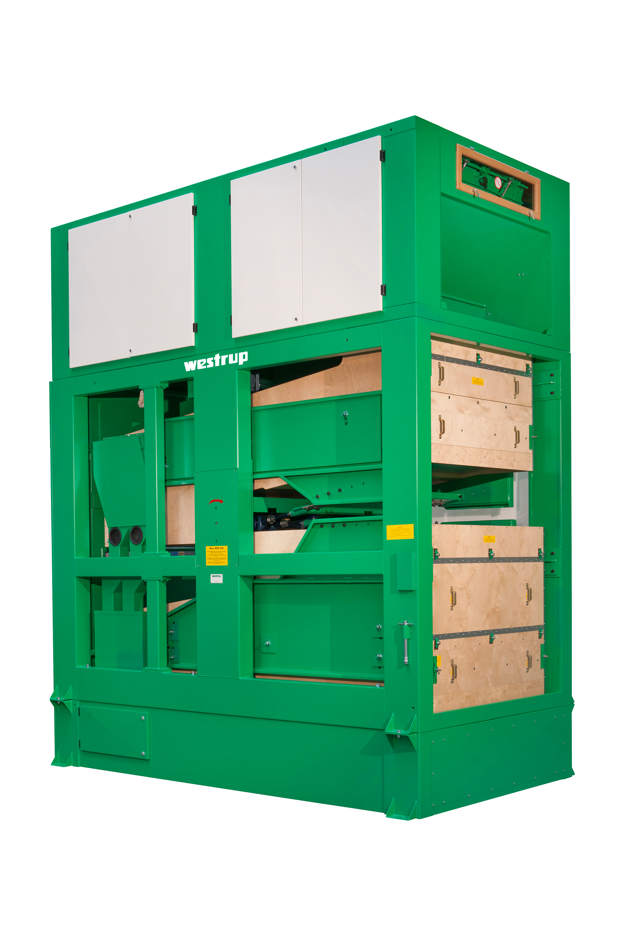 Large green industrial machine with compartments and wooden panels, labeled 'Westrup'.