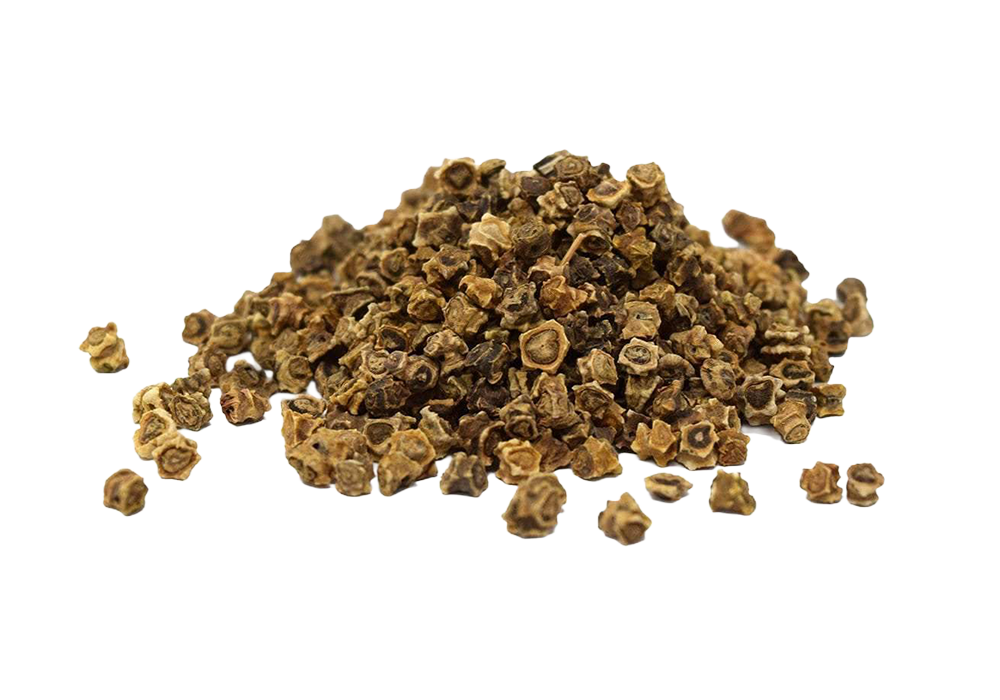 Pile of dry, crushed black peppercorns isolated on white background.