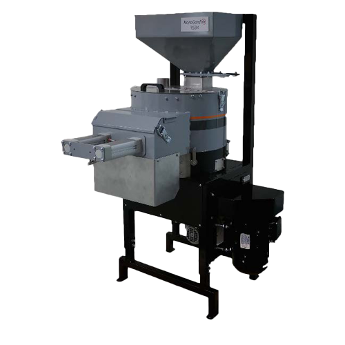 An industrial machine with a funnel at the top, a horizontal metal arm extending from the side, and a rectangular base, used for manufacturing or processing.