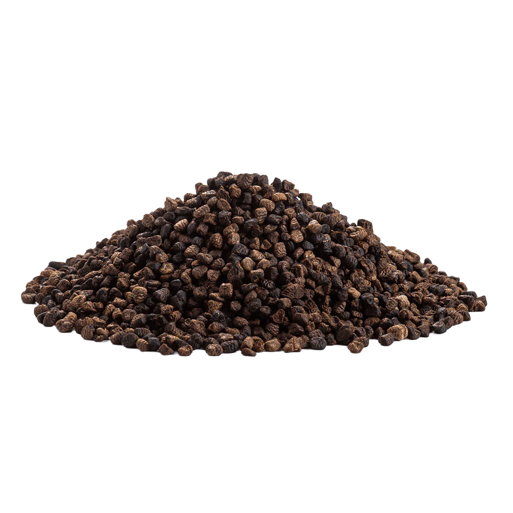 Pile of black peppercorns against a white background.