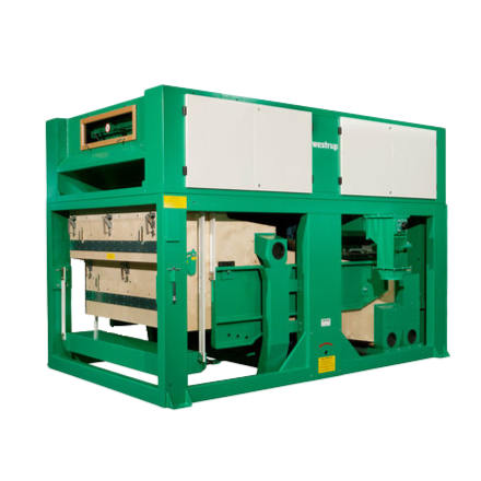 Промышленное оборудование с зеленой металлической рамой и белыми панелями, вероятно, система кондиционирования или вентиляционное оборудование.