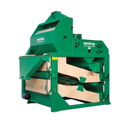 Industrial green wood splitter machine with multiple blades and components.