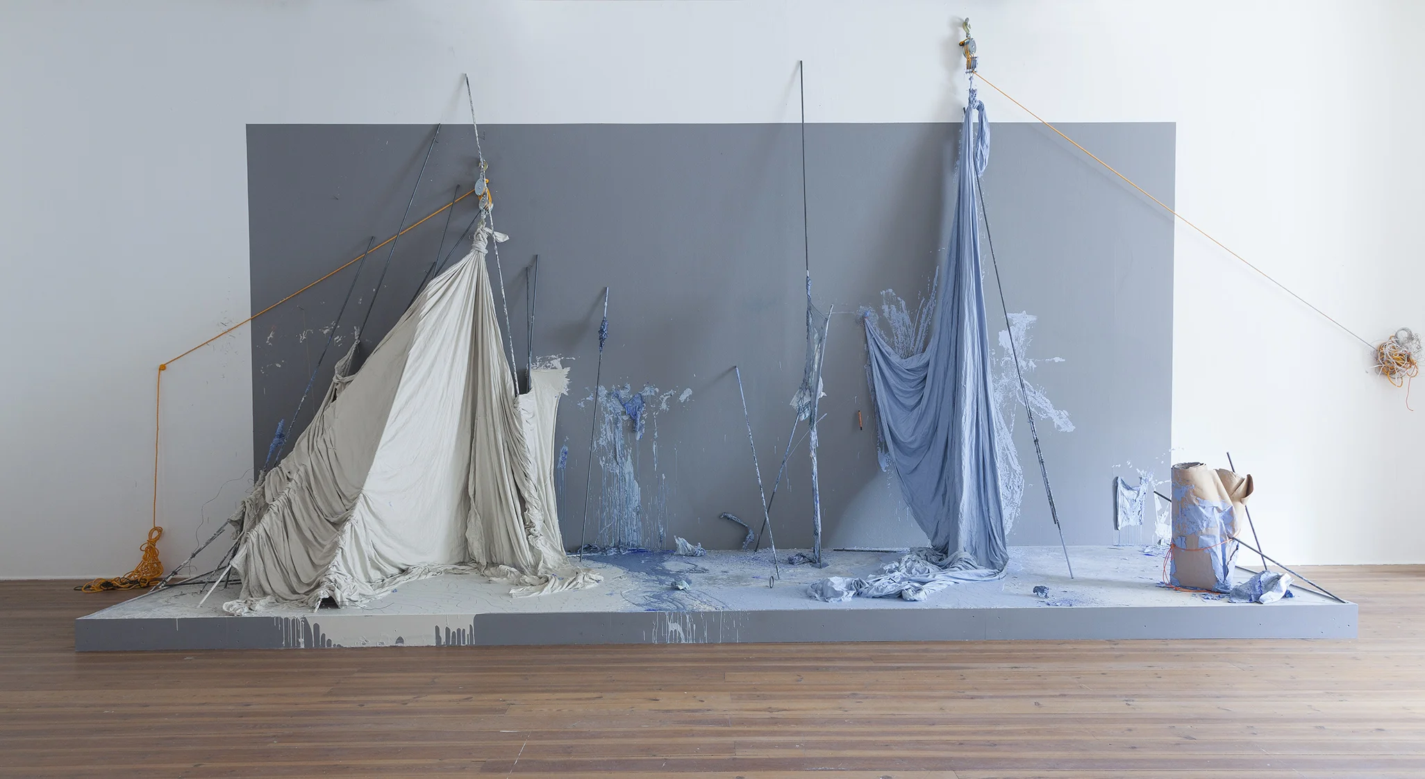   Leaning.  2018. Length 7 m. Clay, steel, textile, rope, cardboard, wire, nails, pulleys.  From the exhibition  Beyond The Object,  Uppsala kunstmuseum 
