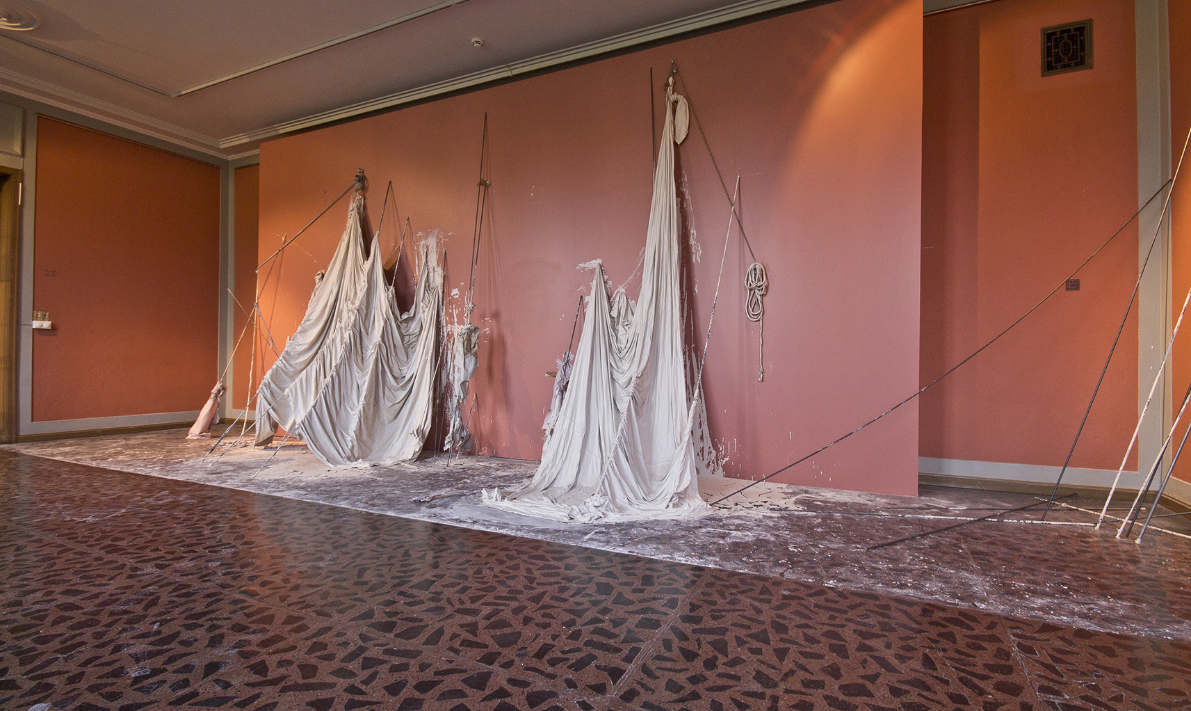   Si det til meg.  2013. Length 10 m. Textile, steel, rope, pulleys, porcelain clay, cardboard, paper, wire, screws, nails, tape, stains, oxides, colour powder. Norwegian Sculpture Biennial, Vigeland-museet 