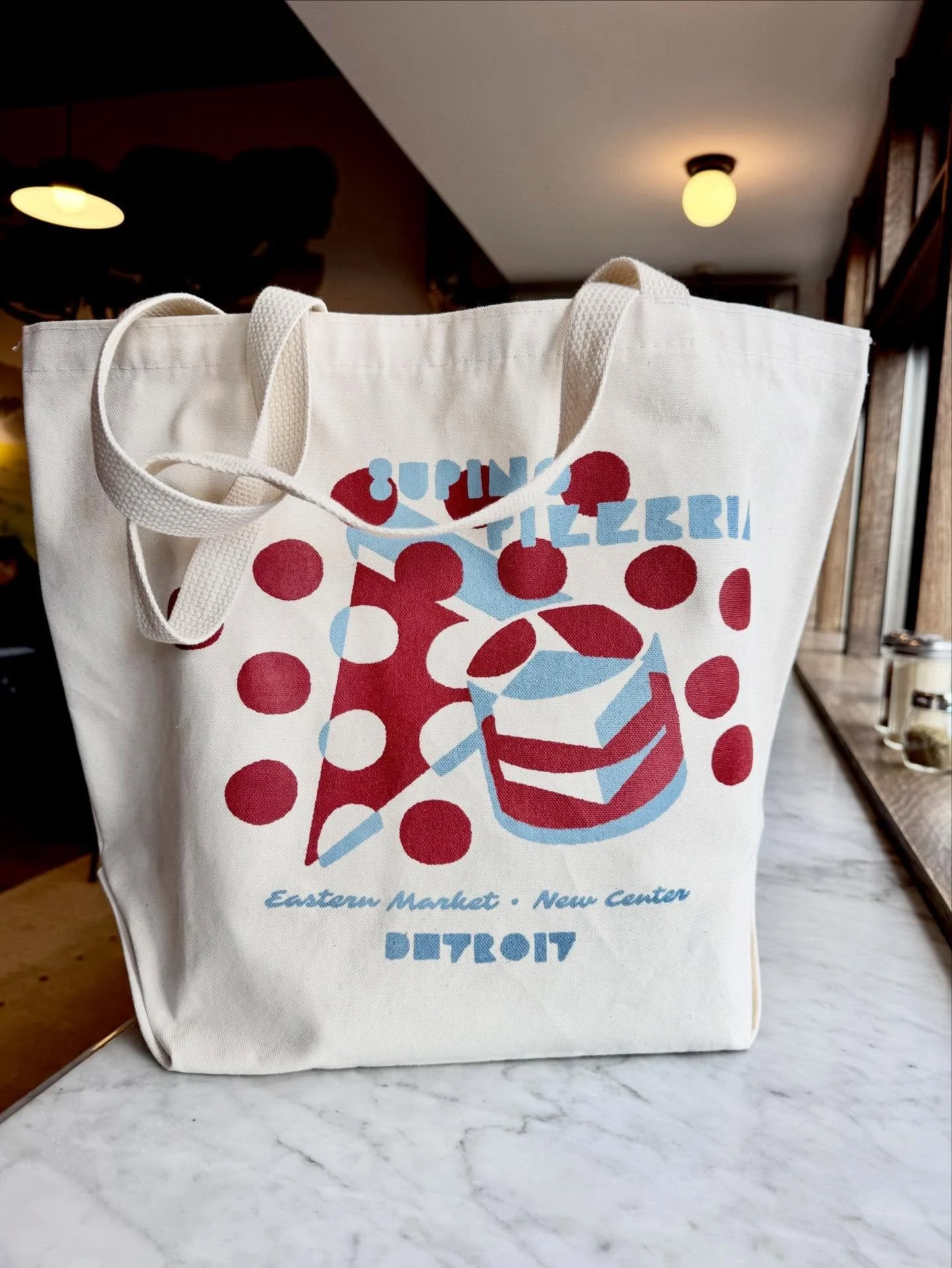 Check out our newest tote designed by the talented @blakejurasdesign and printed with our buddies @espdetroit ! Available at both locations!