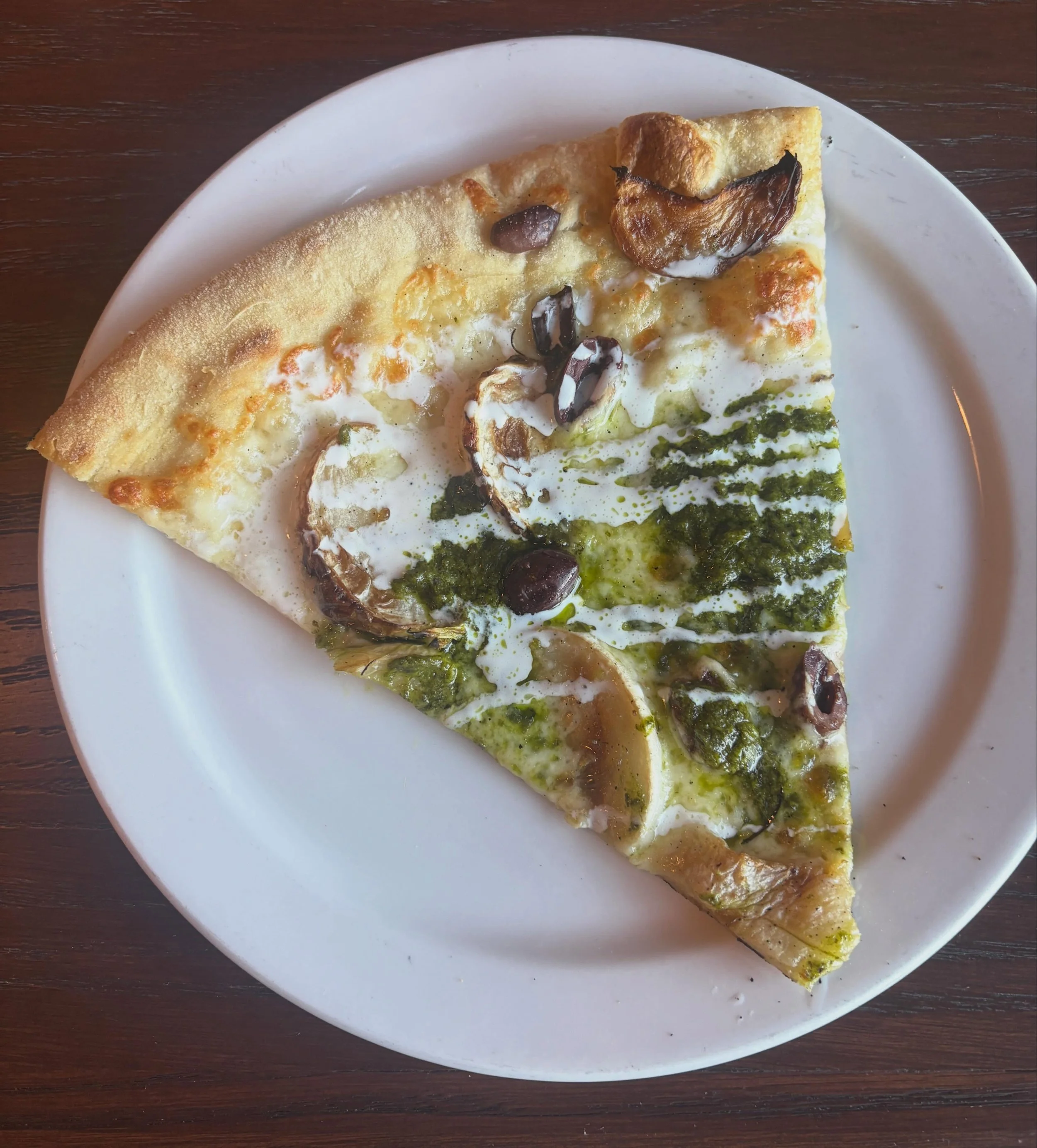 This week&rsquo;s special: a white pie with roasted turnips, turnip pesto, kalamata olives and whipped ch&egrave;vre.