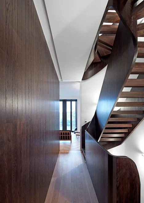 Curvacious-oak-staircase-ascends-through-converted-London-convent-by-John-Smart-Architects_dezeen_4.jpg