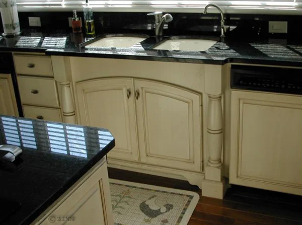 Bumped sink front. Shown with half turned posts and arched top doors