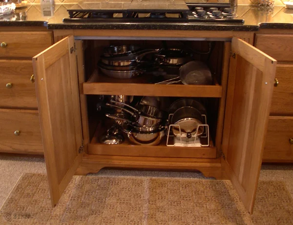 Double under counter pullout shelves. Great for easy storage access