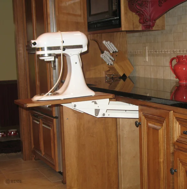 Lift up mixer station hidden behind cabinet doors when not in use