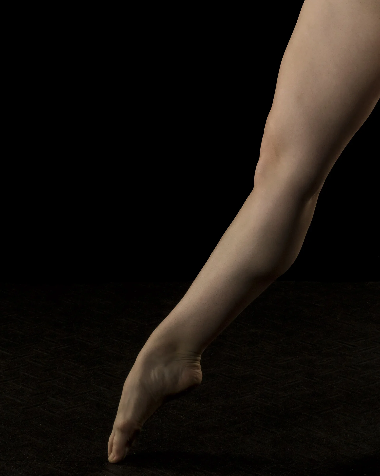 Showing off the leg line, down through the toes.