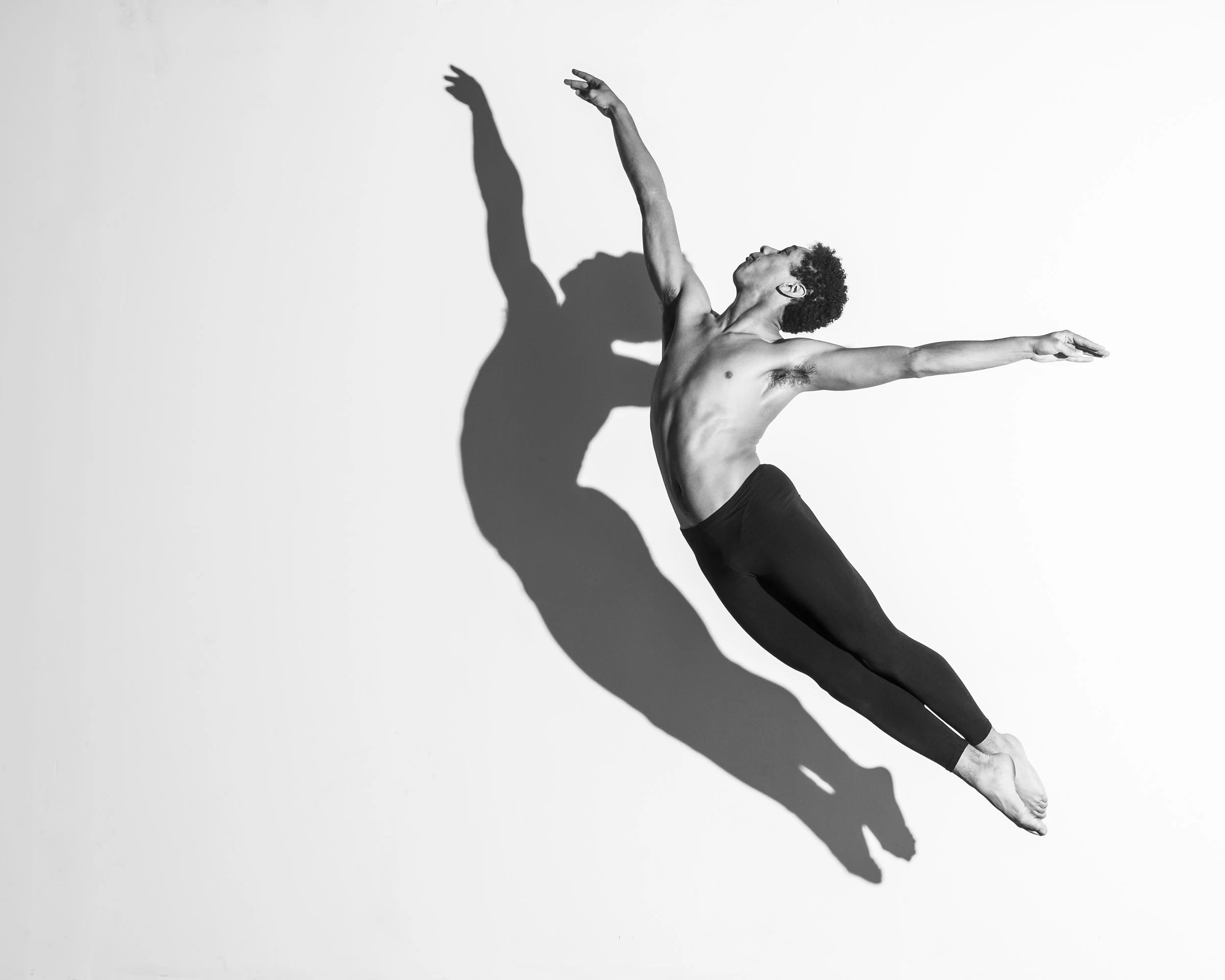 Bram jumping with his shadow