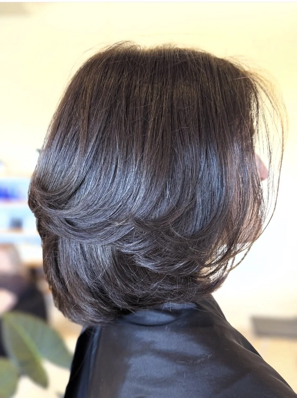 Short layered bob haircut with soft texture and movement