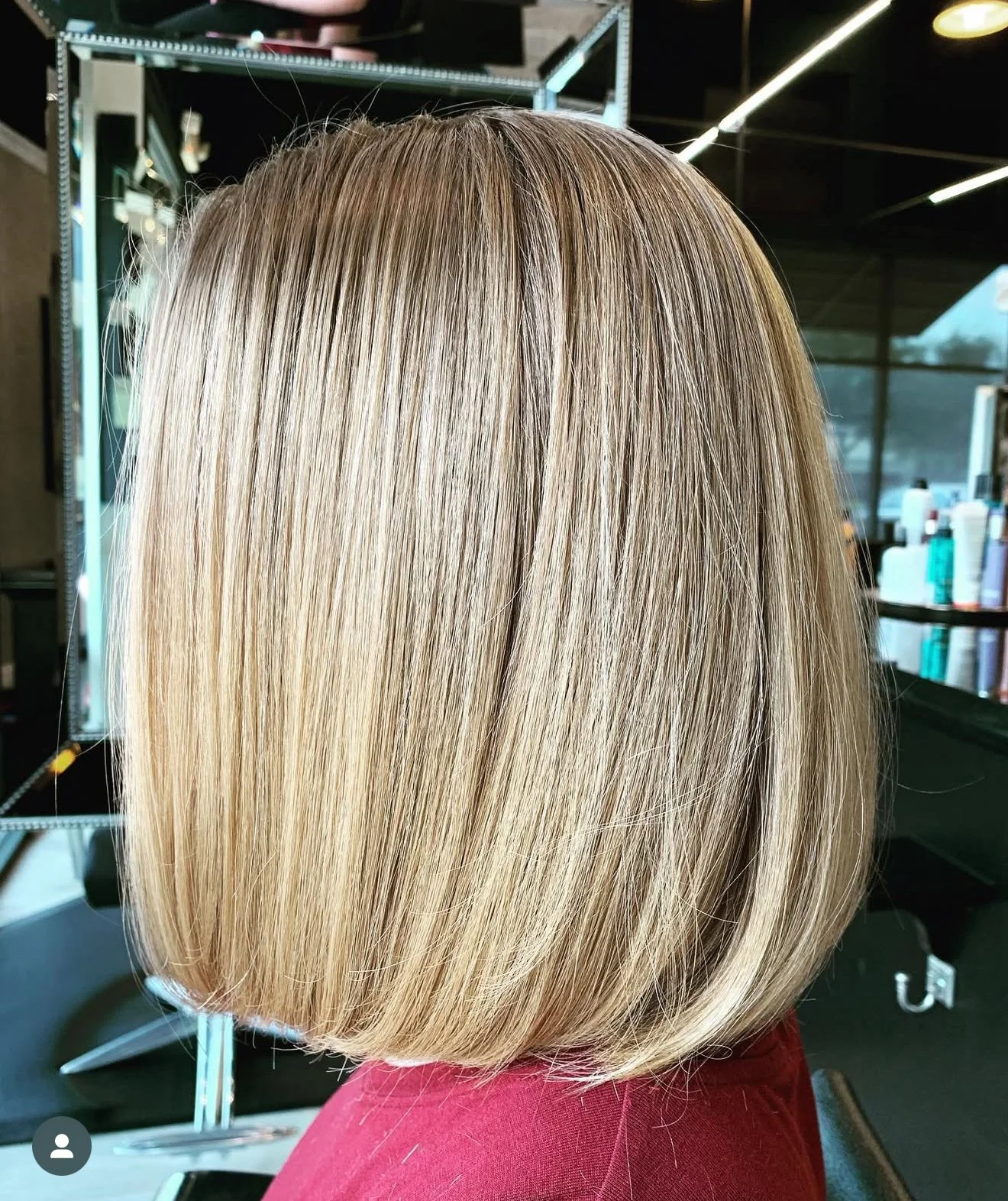 Precision blunt bob haircut in Frisco, Texas with clean lines and sharp geometric shape