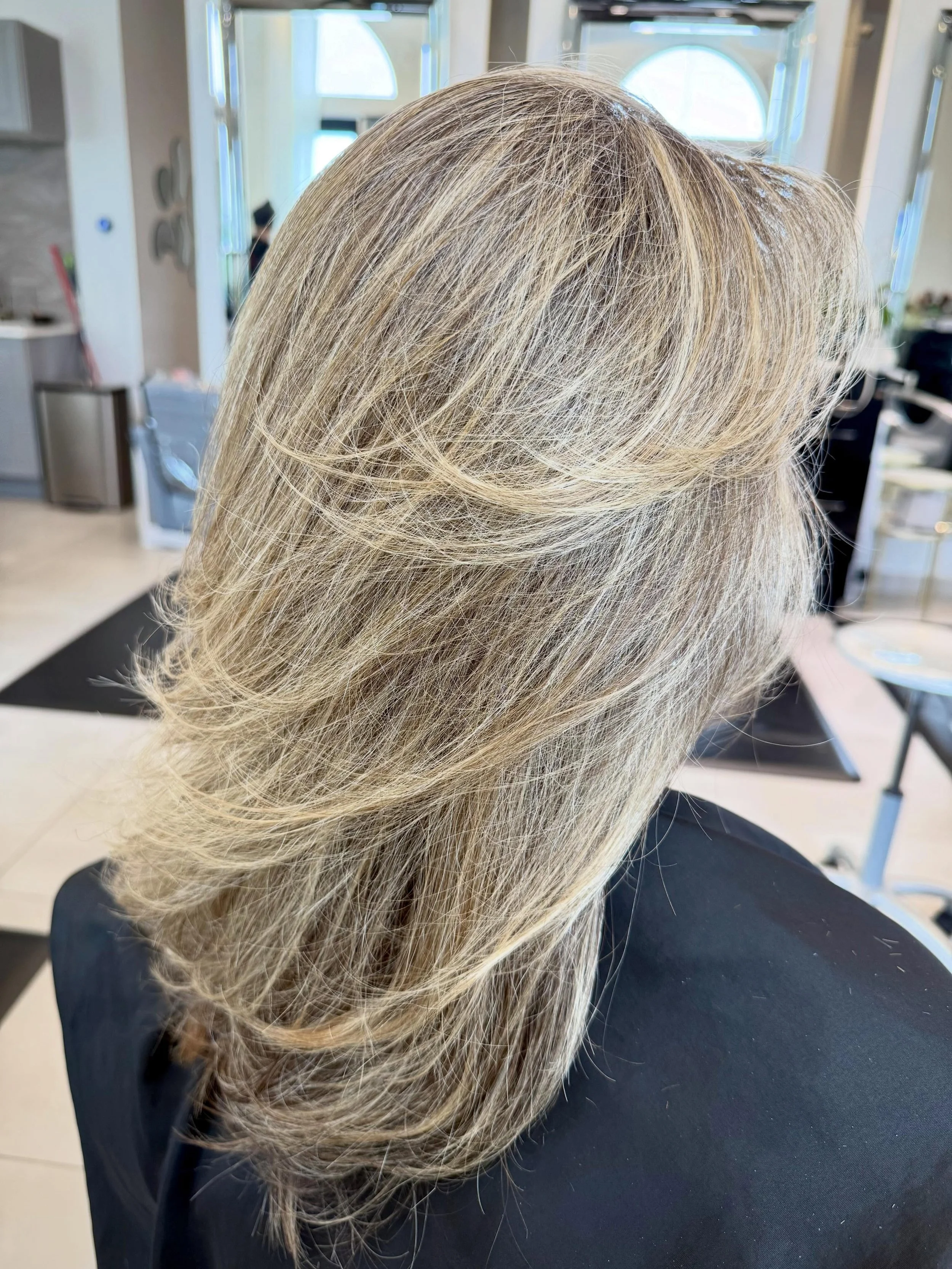 Scott Risk Signature Layers within a Precision Haircut.

Soft, seamless layers designed for movement, shape, and natural flow, paired with natural-looking blonde highlights for refined gray blending and brightness.

The result is polished, dimensiona