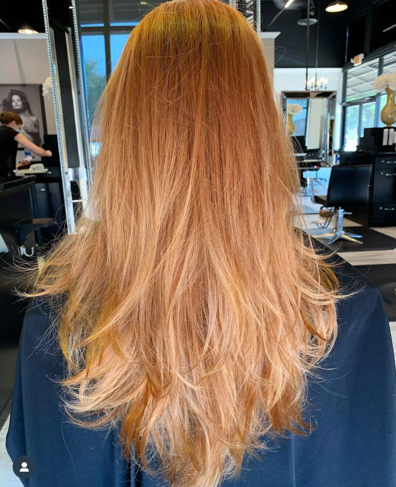 Natural-looking red hair color with precision layered haircut in Nichols Hills Oklahoma City