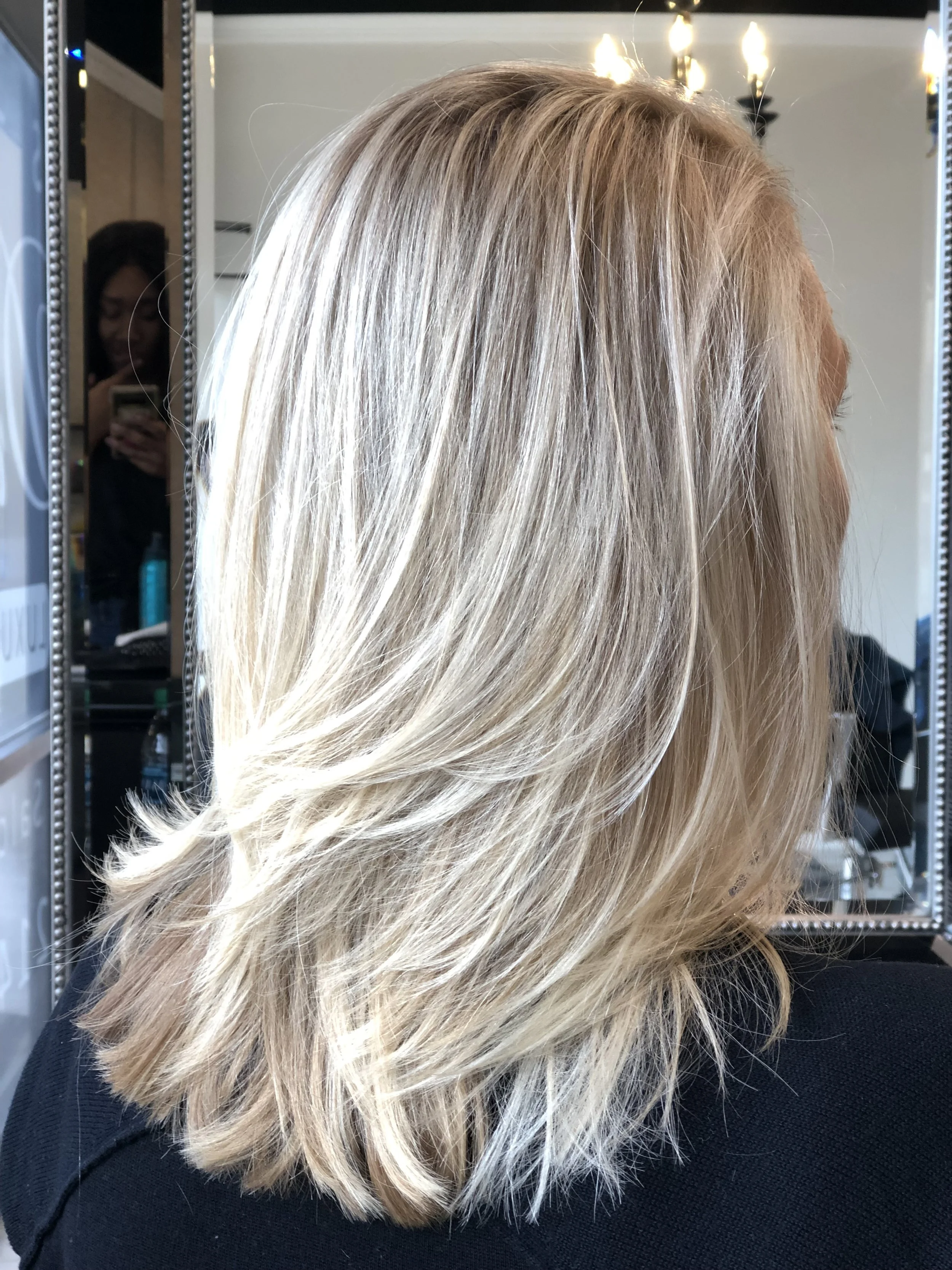 Dimensional blonde highlights with precision layered haircut in Nichols Hills Oklahoma