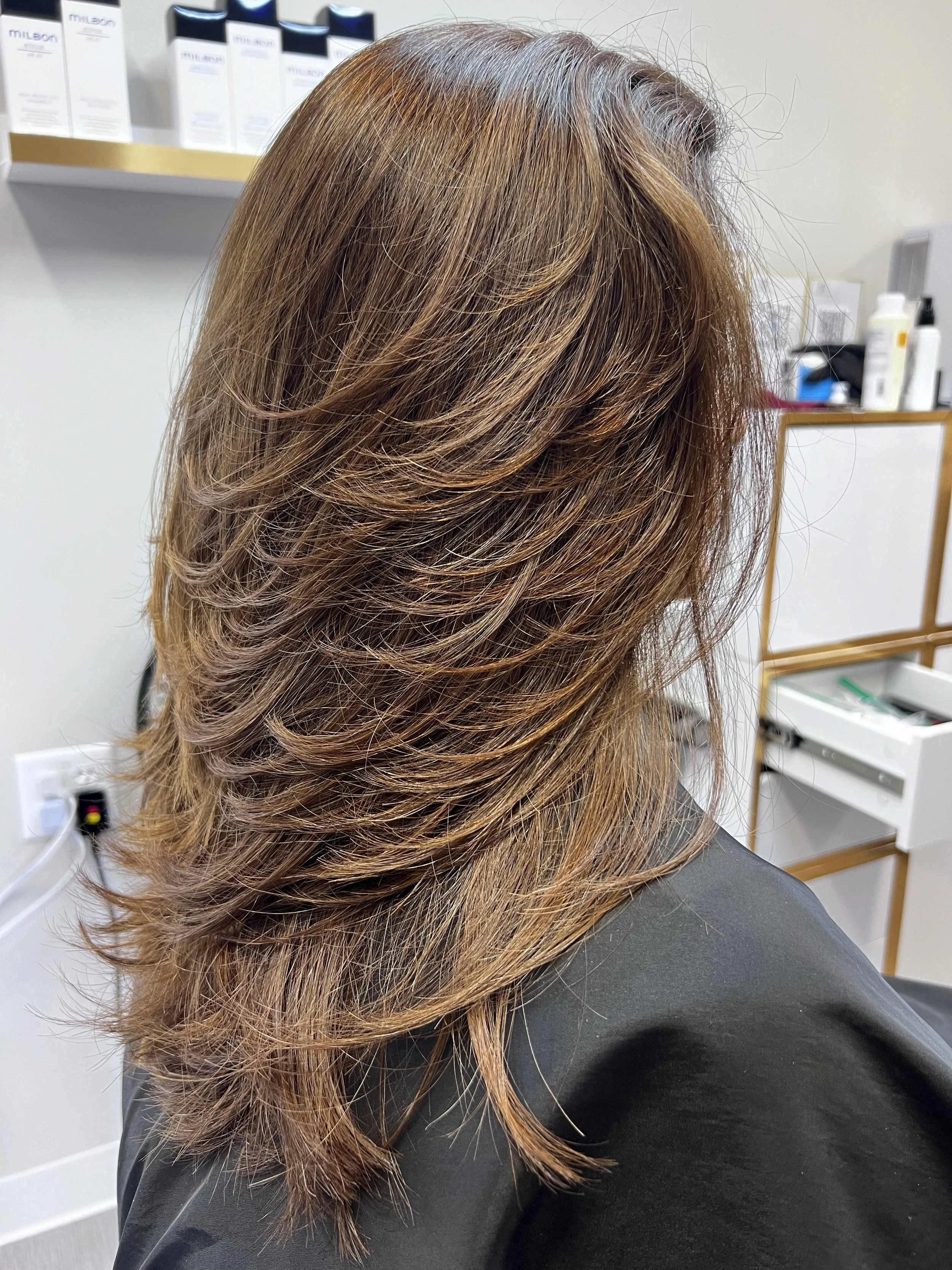 Brunette precision layered haircut designed for fine hair in Nichols Hills Oklahoma