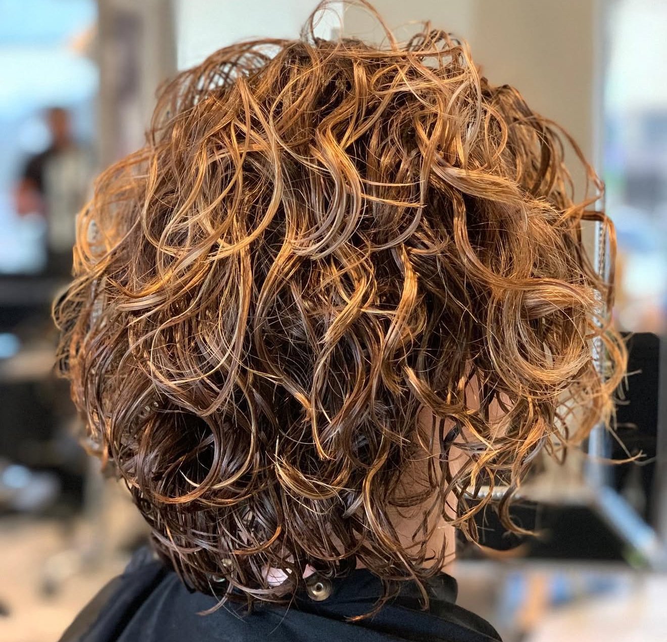 Curly cut in Frisco TX designed for bounce, shape, and definition