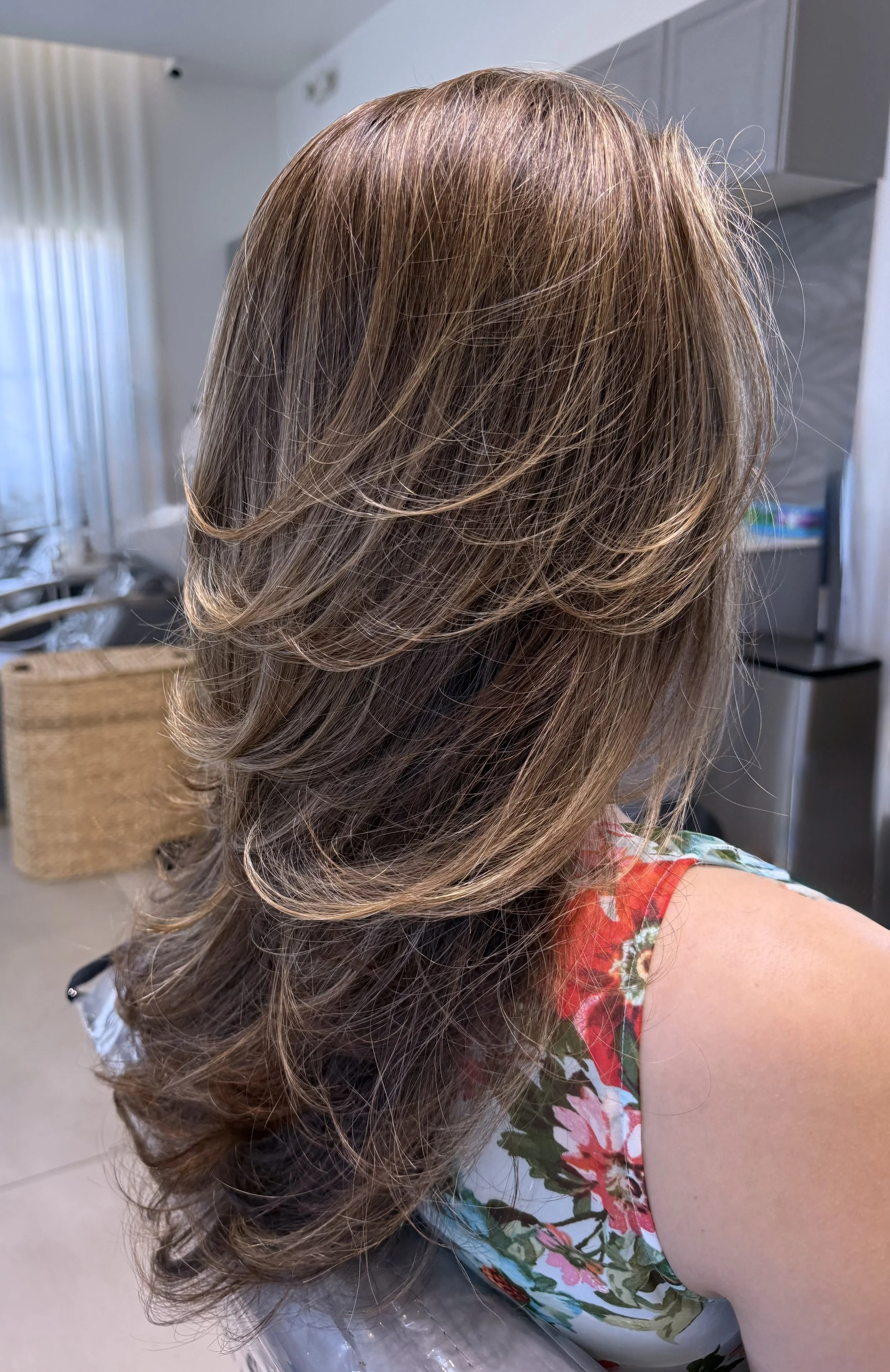 Dimensional highlights and Scott Risk Signature Layers, Frisco TX hairstylist. Custom-placed to mimic the way hair lightens naturally in the sun.