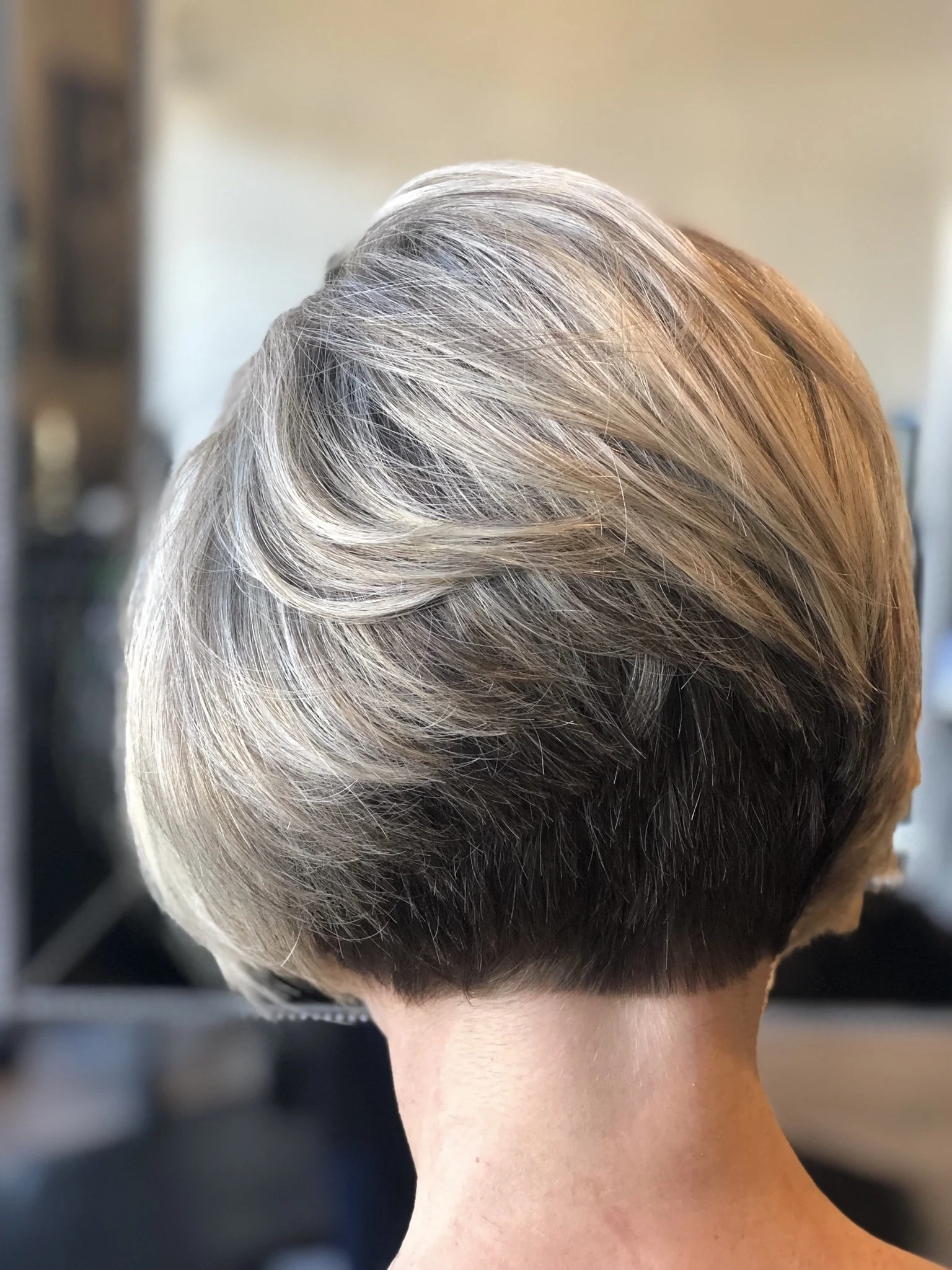 Precision layered bob with gray coverage for fine hair and natural-looking highlights in Nichols Hills Oklahoma