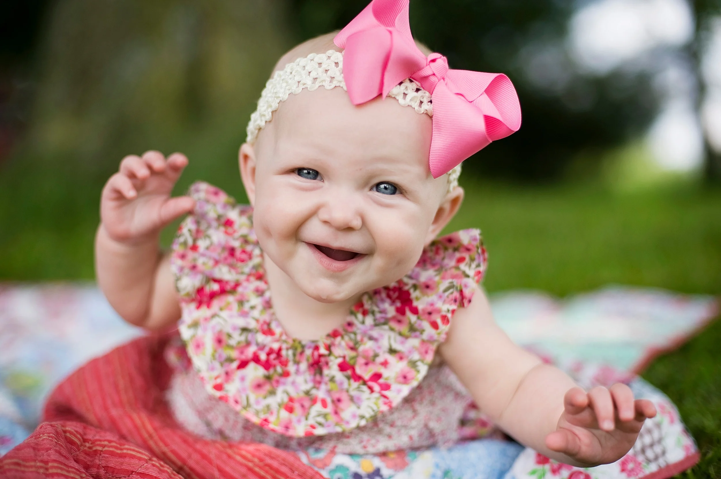 22-floral-baby-girl-laughing-portrait.jpg